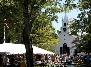The auction tent set up on the green in Dennis Village